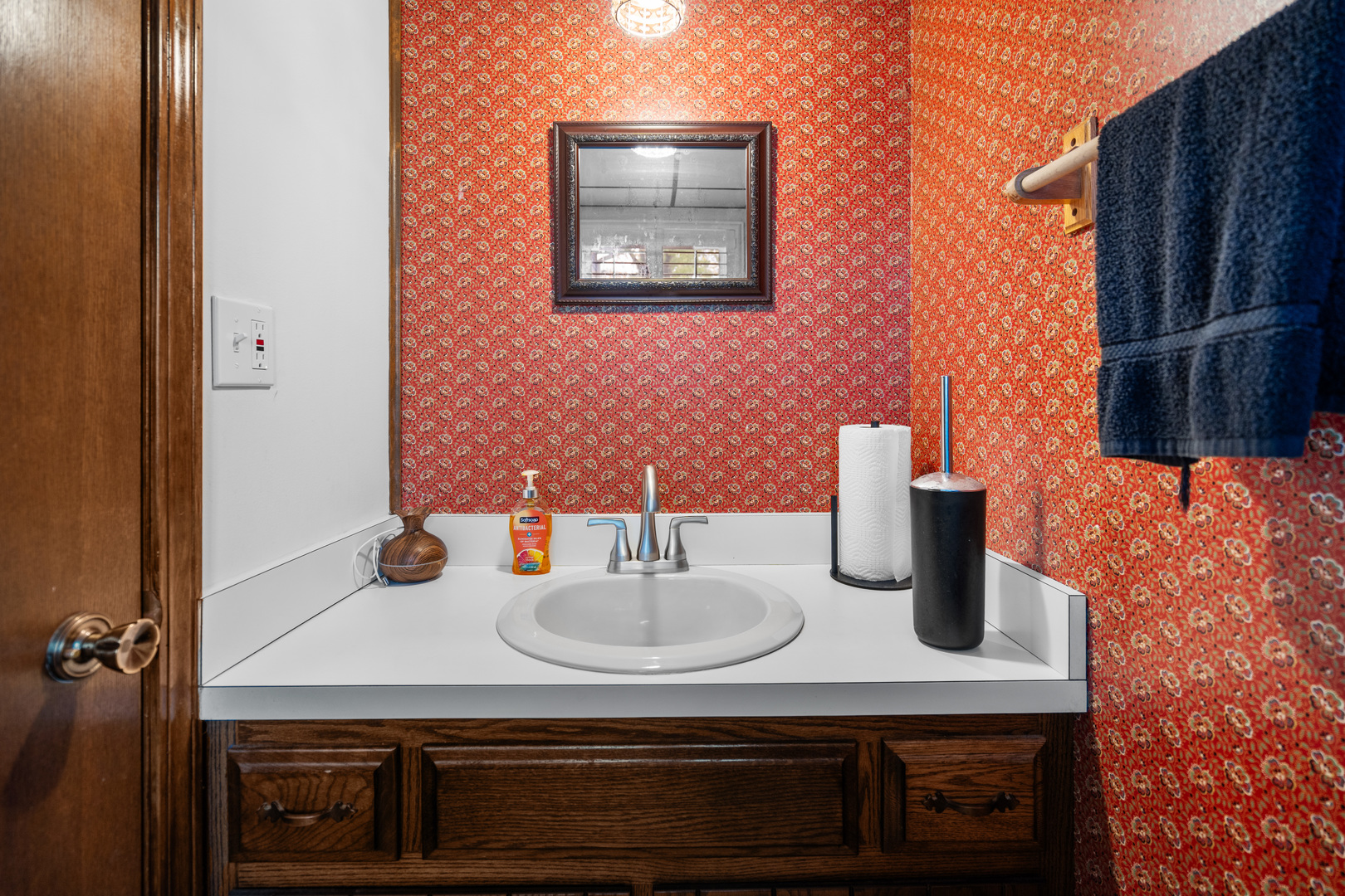 3479 Ronald Road Crete, IL 60417 - Photo 29 of 38 a bathroom with a sink and a mirror