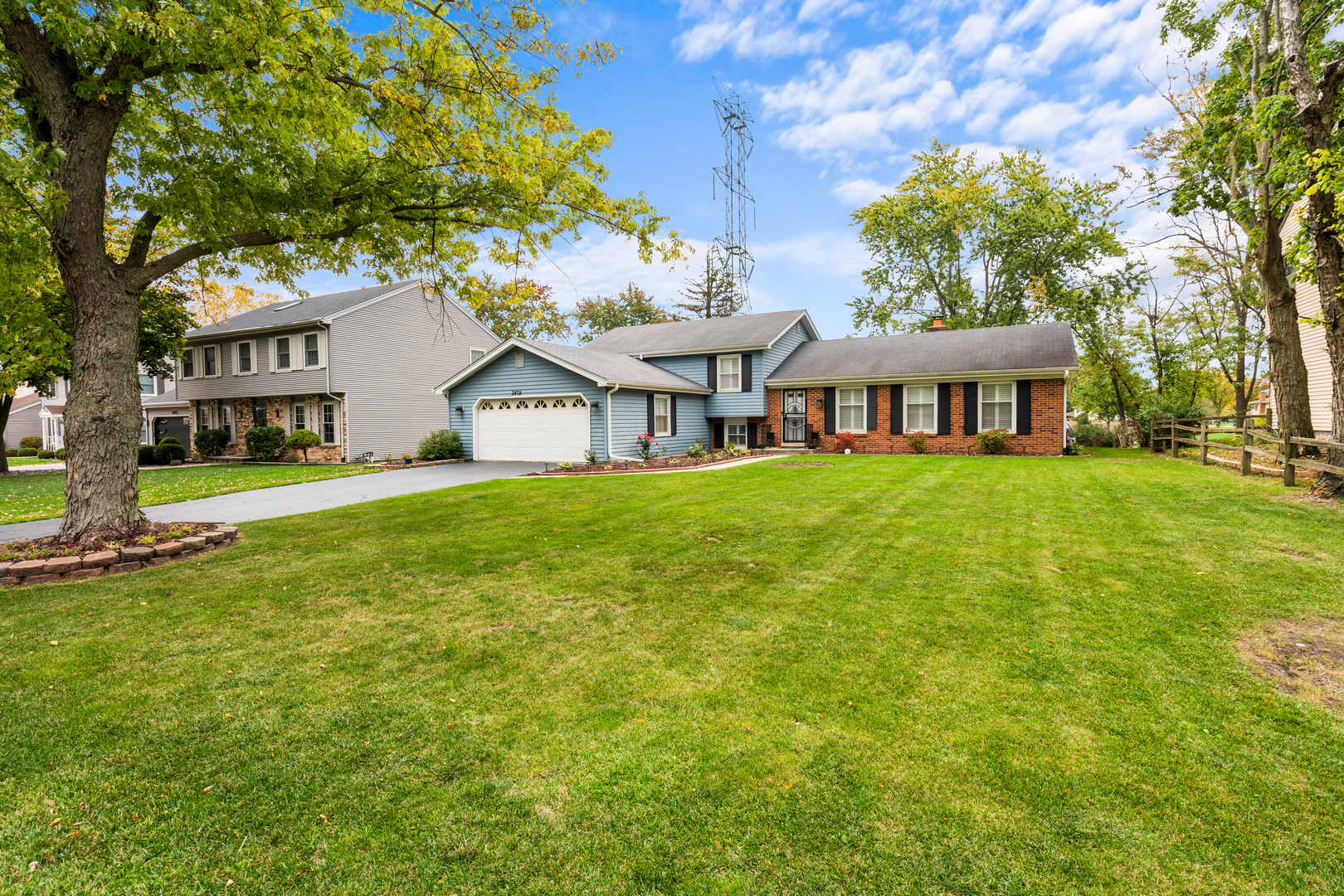 3479 Ronald Road Crete, IL 60417 - Photo 3 of 38 a view of a house with a big yard and large trees