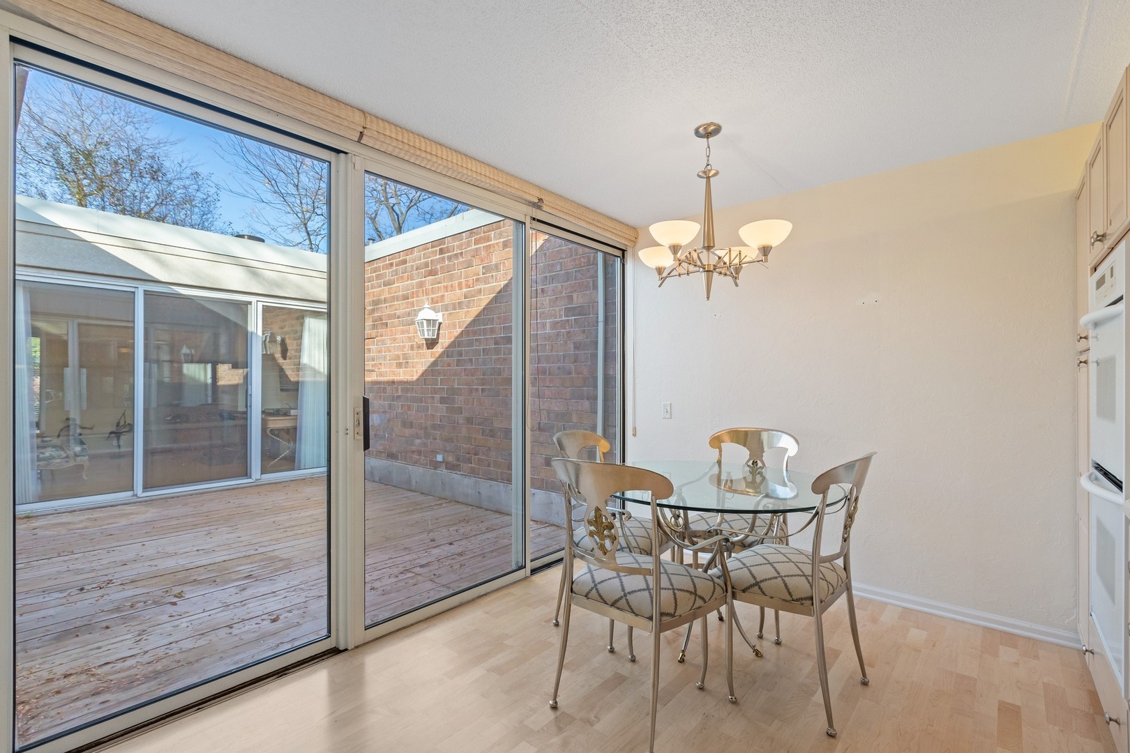 1 Wellington Road Northbrook, IL 60062 - Photo 14 of 27 a dining room with furniture and large windows