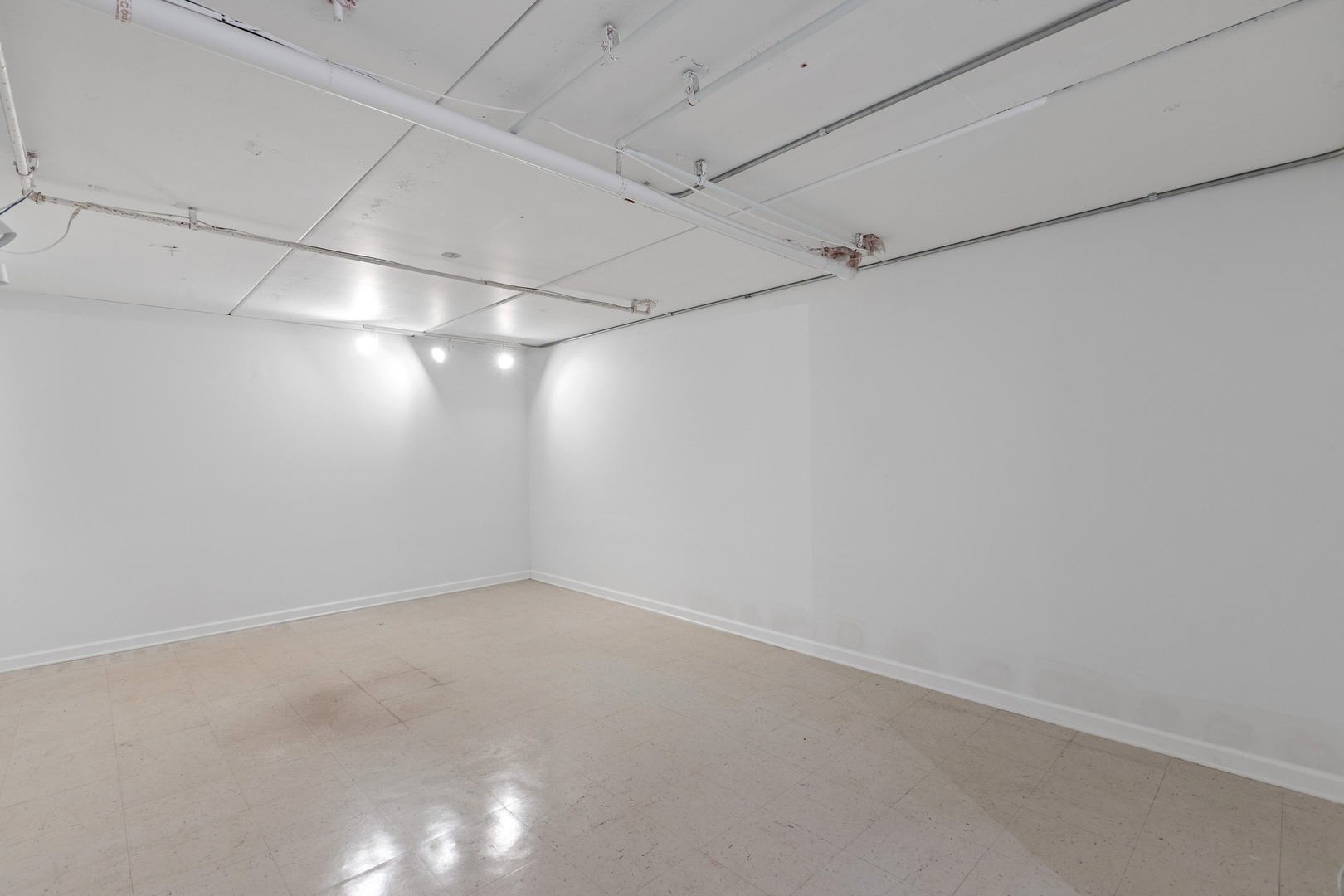 1 Wellington Road Northbrook, IL 60062 - Photo 23 of 27 a view of a room with racks on the wall