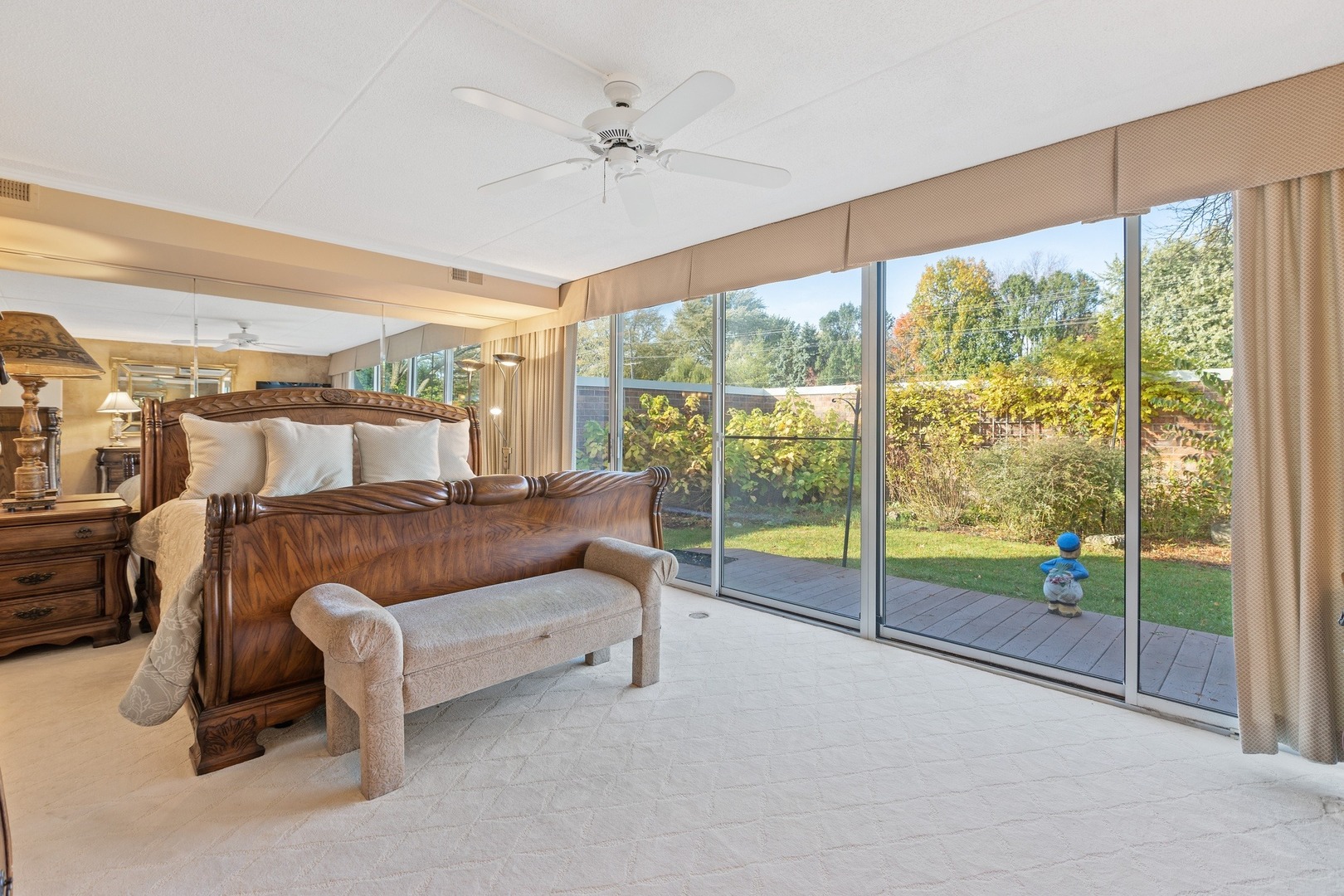 1 Wellington Road Northbrook, IL 60062 - Photo 5 of 27 a bedroom with furniture and large windows