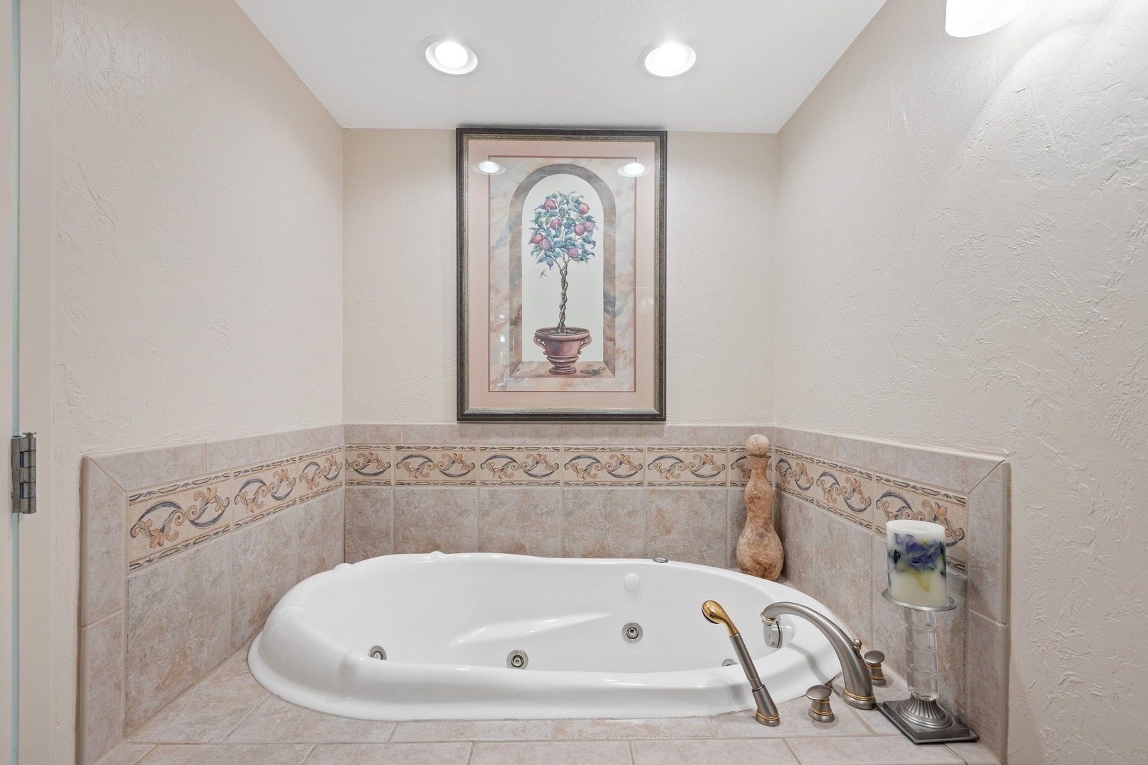 1 Wellington Road Northbrook, IL 60062 - Photo 7 of 27 a white bath tub sitting in a bathroom