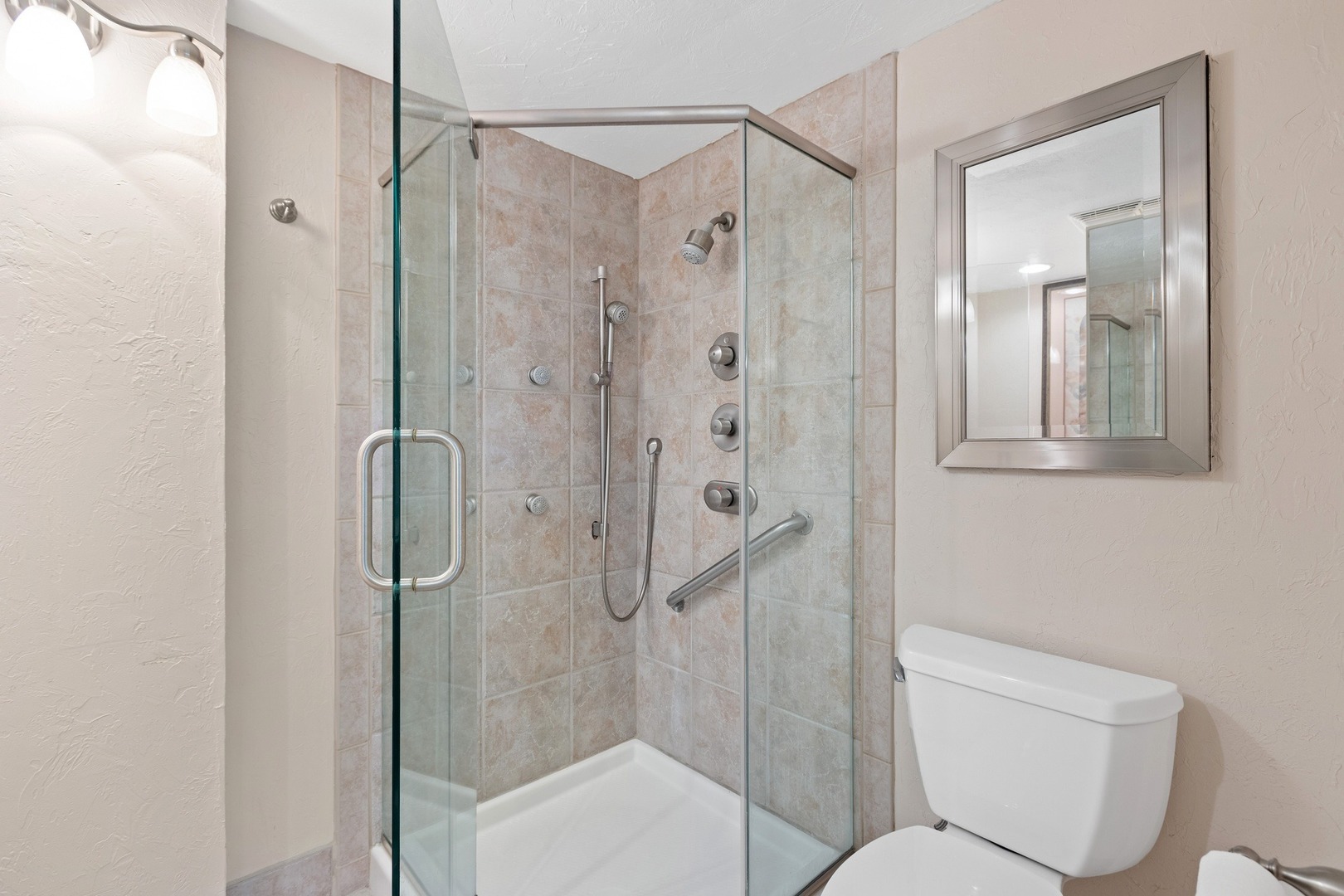 1 Wellington Road Northbrook, IL 60062 - Photo 8 of 27 a bathroom with a shower and a toilet