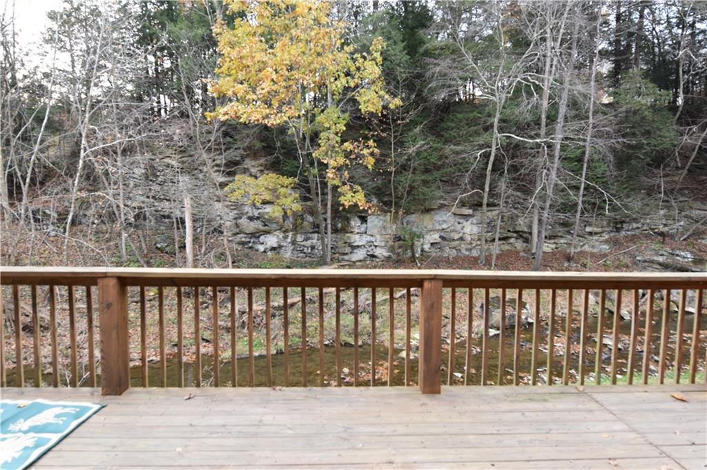 1242 Stitts Run Road Vandergrift, PA 15690 - Photo 11 of 23 a balcony with wooden floor and fence