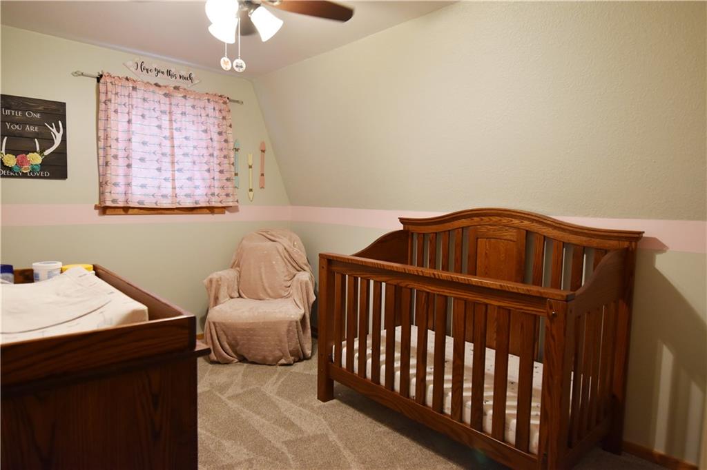 1242 Stitts Run Road Vandergrift, PA 15690 - Photo 15 of 23 a bedroom with a bed and window