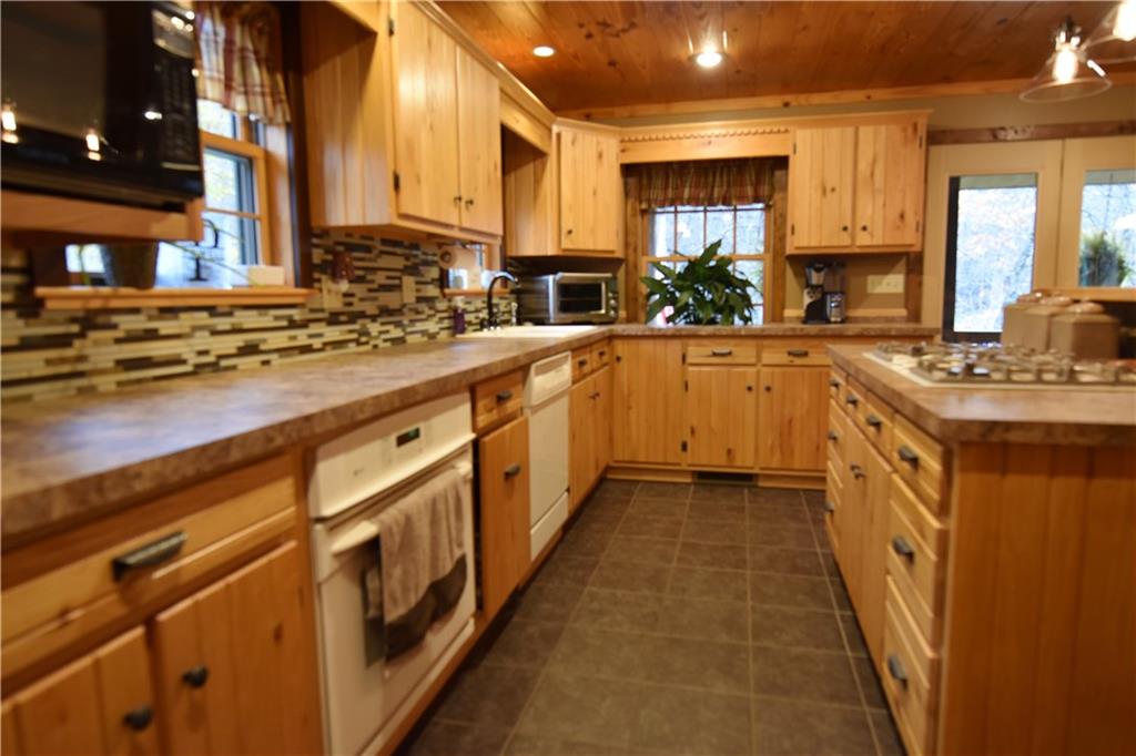 1242 Stitts Run Road Vandergrift, PA 15690 - Photo 6 of 23 a large kitchen with stainless steel appliances lots of counter space and a sink