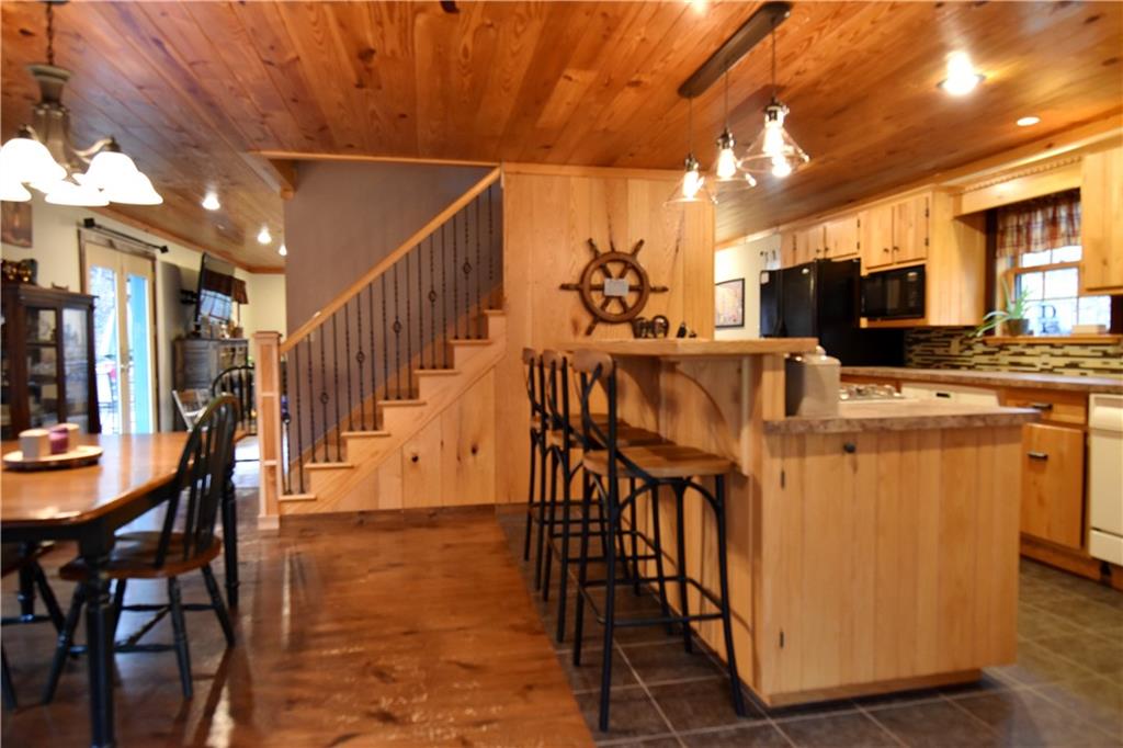 1242 Stitts Run Road Vandergrift, PA 15690 - Photo 7 of 23 a dining room with furniture entryway and wooden floor
