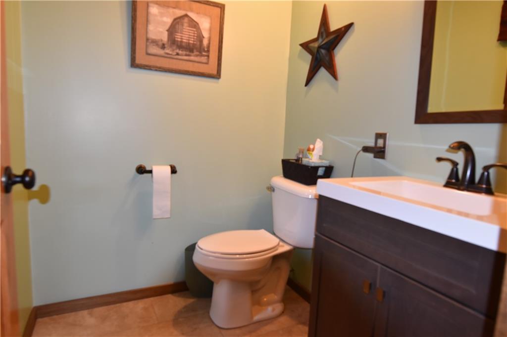 1242 Stitts Run Road Vandergrift, PA 15690 - Photo 8 of 23 a bathroom with a toilet sink and mirror