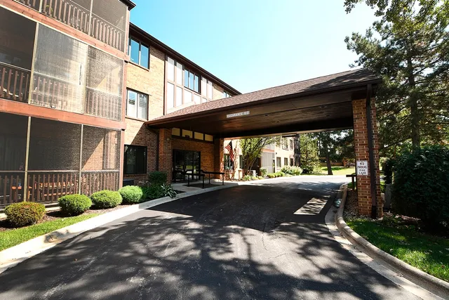a view of a house and a yard