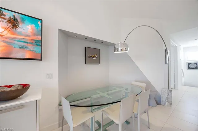 a view of entryway with kitchen and hallway