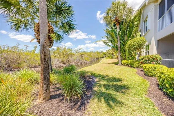 a view of ocean view with large tree