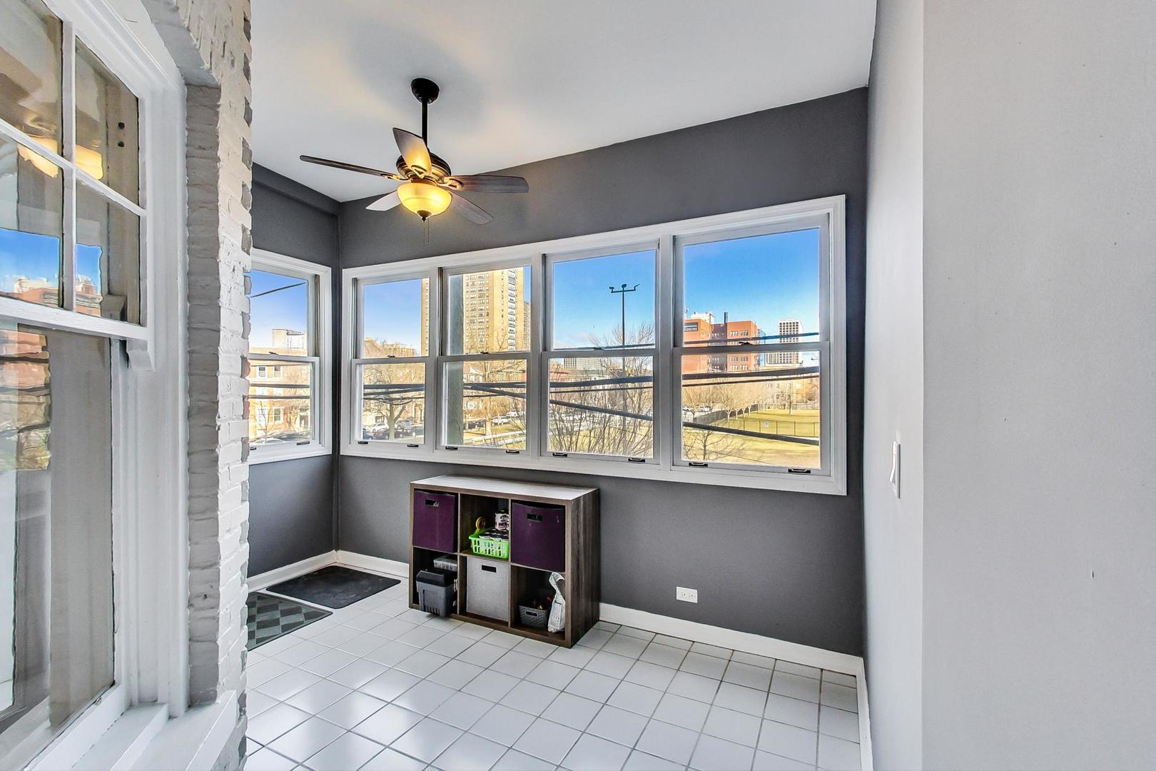 742 West Bittersweet Place, Unit 2W Chicago, IL 60613 - Photo 17 of 21 a view of livingroom with hardwood floor and workspace