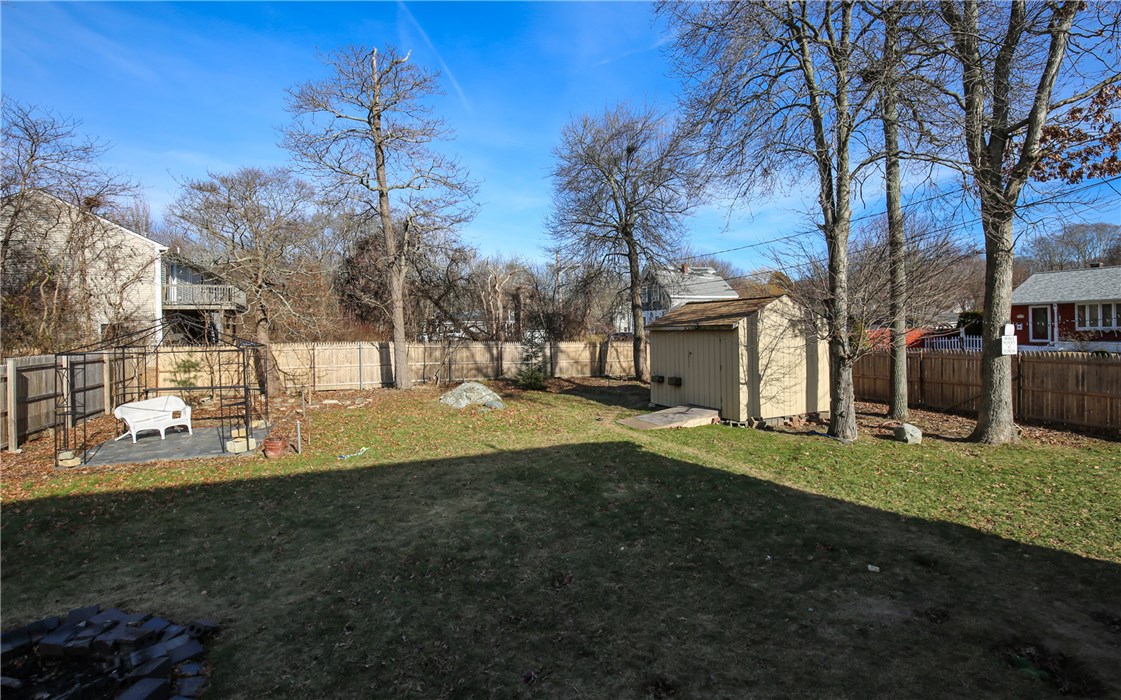 200 Ferncroft Road Somerset, MA 02726 - Photo 35 of 38 Very Spacious Fenced in back yard complete with Fire Pit and Shed