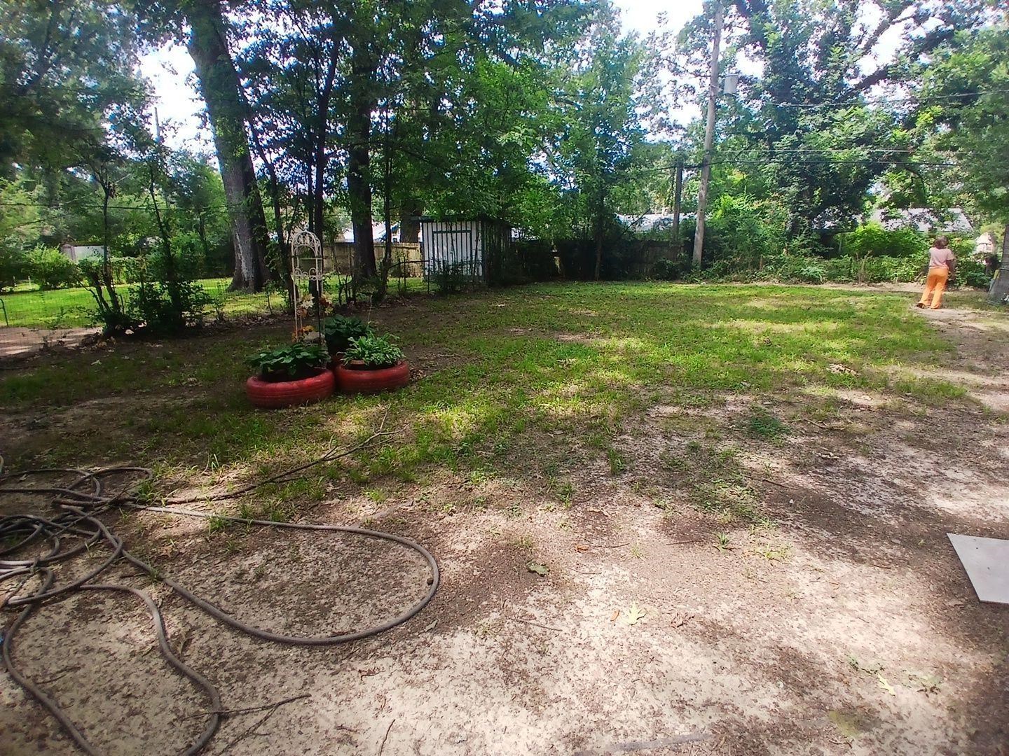4480 Garnett Road Memphis, TN 38117 - Photo 7 of 15 Expansive outdoor space featuring mature trees and established greenery