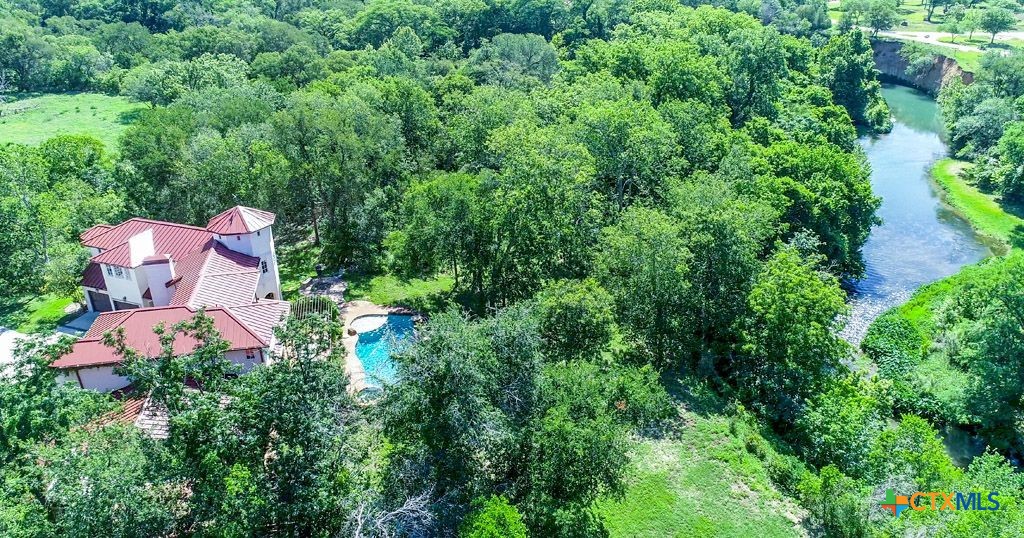 541 Martindale Falls Road Martindale, TX 78655 - Photo 37 of 44 an aerial view of a house with a yard fountain and outdoor seating
