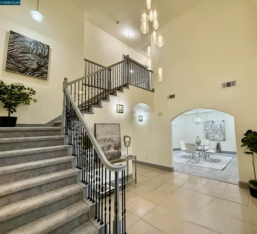 a view of a hallway with staircase
