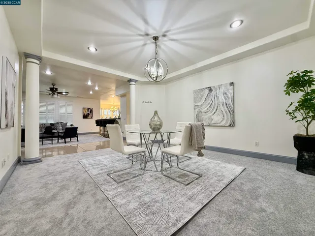 a view of a dining room with furniture