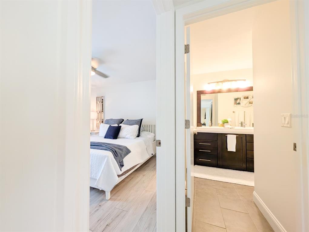 10200 Belle Rive Boulevard, Unit 241 Jacksonville, FL 32256 - Photo 11 of 25 a bedroom with a bed and a window