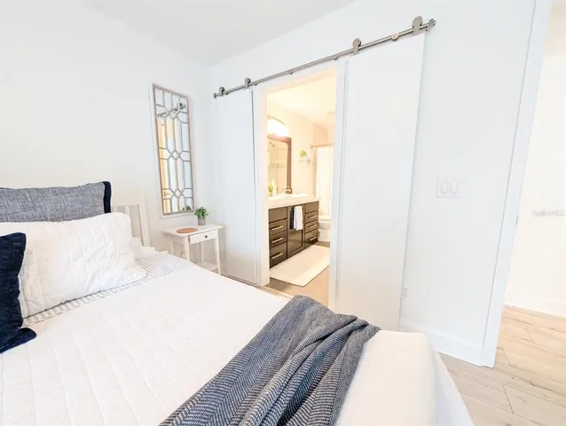 a bathroom with a double vanity sink mirror double vanity and toilet