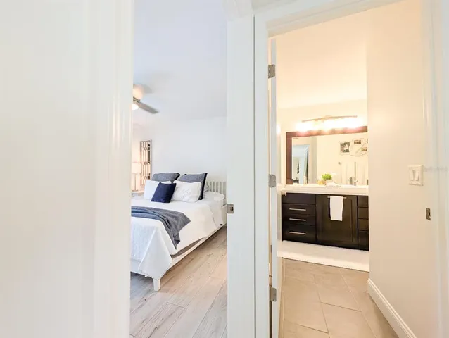 a bathroom with a sink a double vanity and a mirror