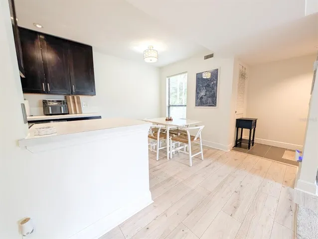 a bathroom with a shower and a window