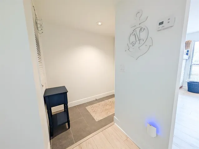 a front view of a house with a white door