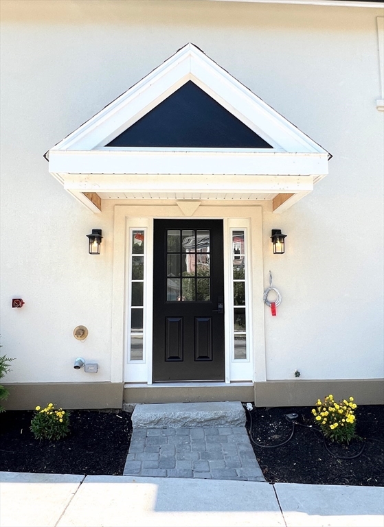 8 Crystal Street, Unit 3 Melrose, MA 02176 - Photo 4 of 24 a view of entryway