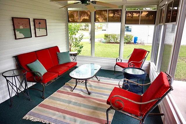 a outdoor living space with furniture and a table