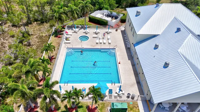 a view of a wooden door with a bench