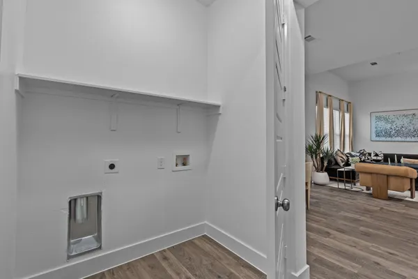 a view of a livingroom with furniture and toys