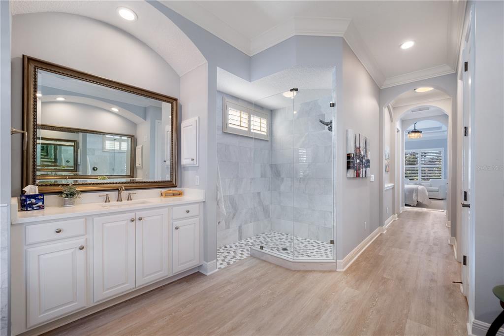 14721 Bowfin Terrace Lakewood Ranch, FL 34202 - Photo 19 of 50 a bathroom with a double vanity sink and mirror