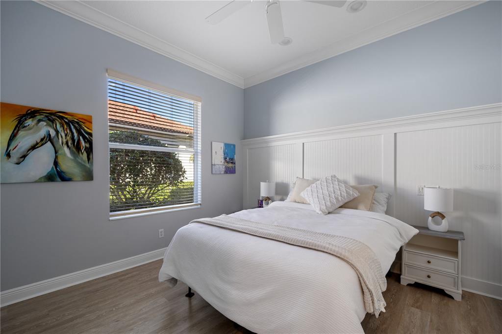 14721 Bowfin Terrace Lakewood Ranch, FL 34202 - Photo 27 of 50 a bedroom with a bed and a window