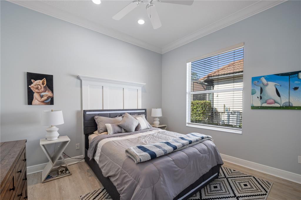 14721 Bowfin Terrace Lakewood Ranch, FL 34202 - Photo 29 of 50 a bedroom with a bed and a window