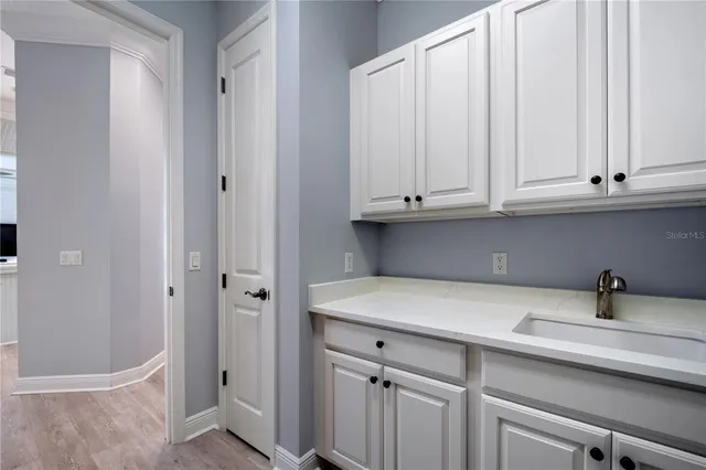 a view of cabinets with stainless steel appliances