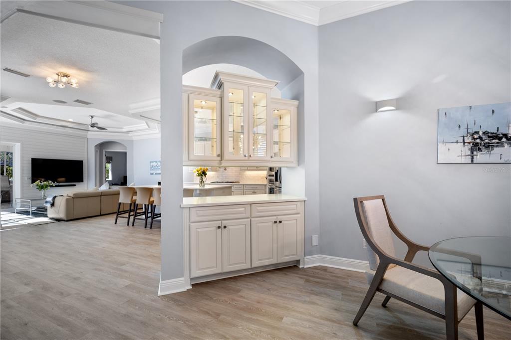 14721 Bowfin Terrace Lakewood Ranch, FL 34202 - Photo 33 of 50 a living room with furniture and a fireplace