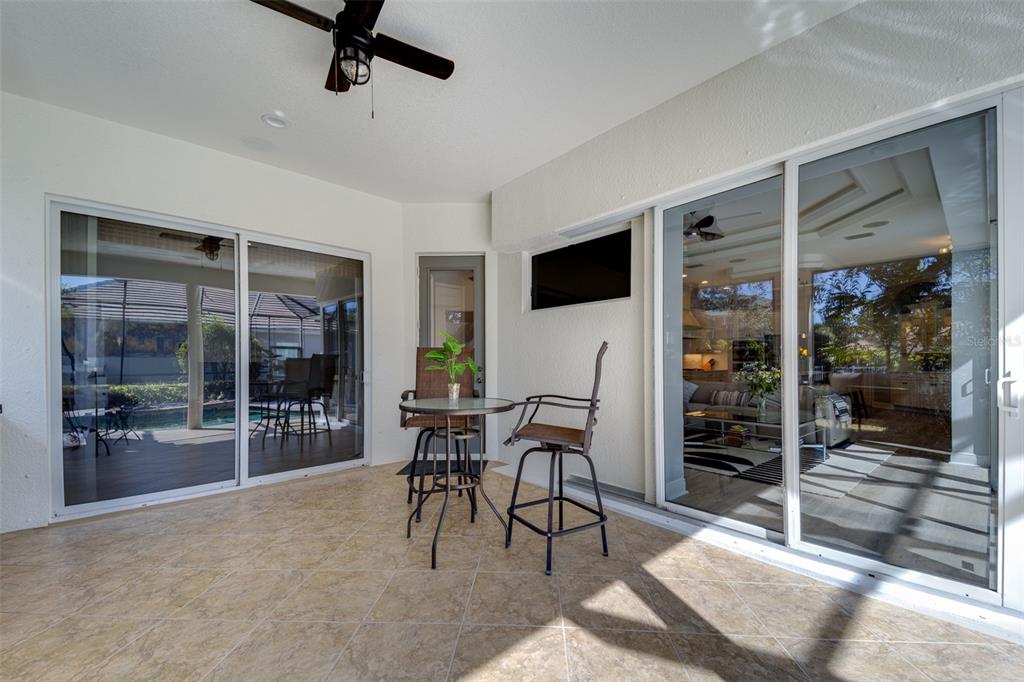 14721 Bowfin Terrace Lakewood Ranch, FL 34202 - Photo 38 of 50 a dining room with furniture and window
