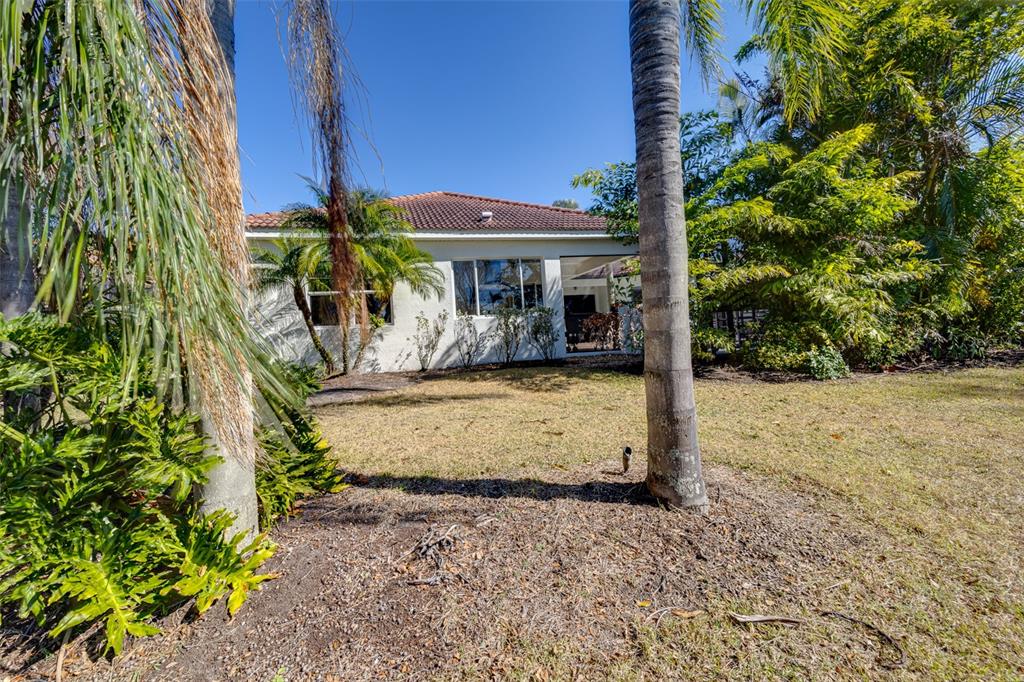 14721 Bowfin Terrace Lakewood Ranch, FL 34202 - Photo 46 of 50 a view of a house with a yard