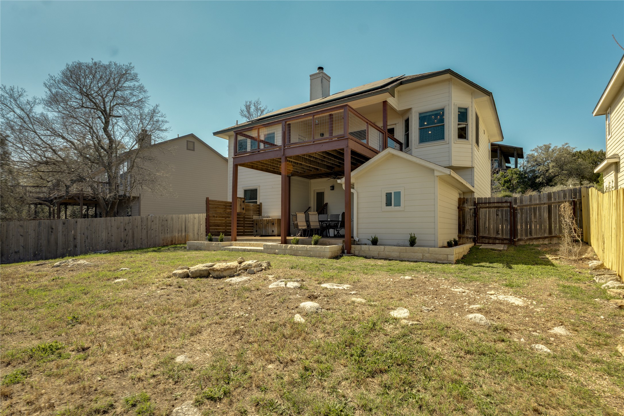 330 Southwind Road Point Venture, TX 78645 - Photo 27 of 39 Outside, you’ve got yard room to build your ideal hangout, cornhole, firepit, or all the above.