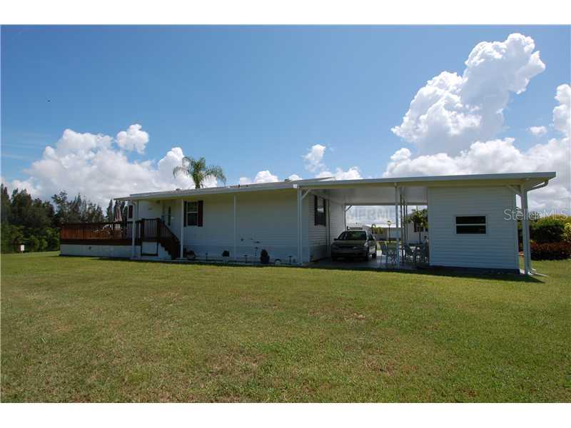 4300 Riverside Drive, Unit 177 Punta Gorda, FL 33982 - Photo 1 of 1 Exterior Front - Water Front Home in River Forest Mobile Home Park