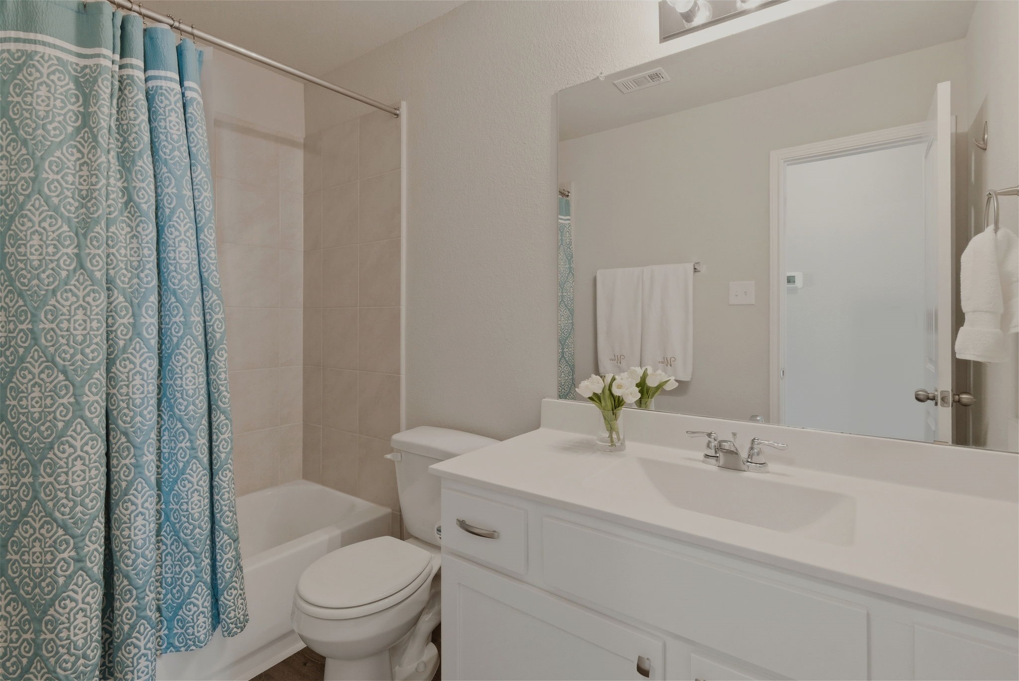 2542 Sturgeon Way Conroe, TX 77384 - Photo 28 of 40 a bathroom with a sink a toilet and shower