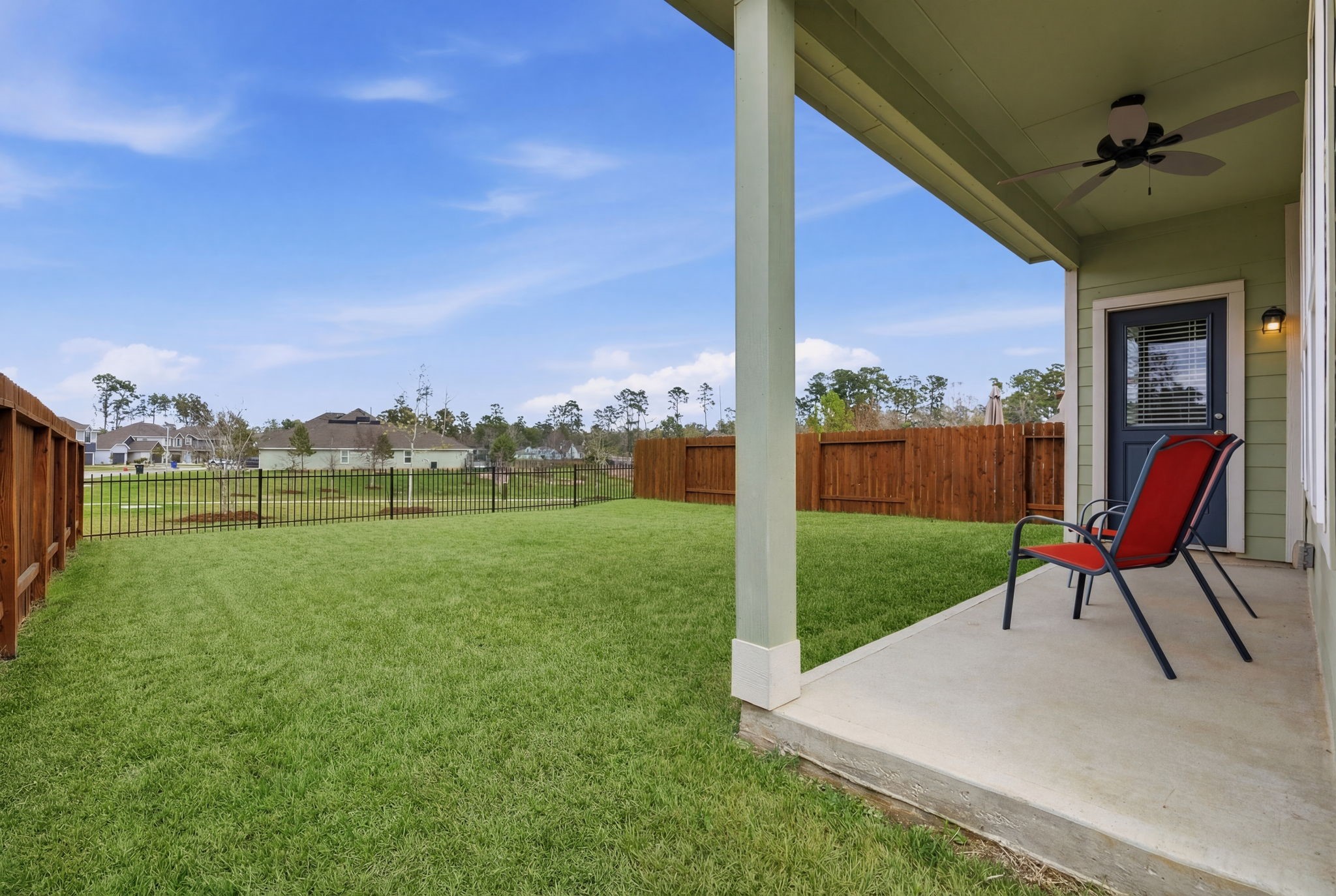 2542 Sturgeon Way Conroe, TX 77384 - Photo 30 of 40 a view of a house with a backyard