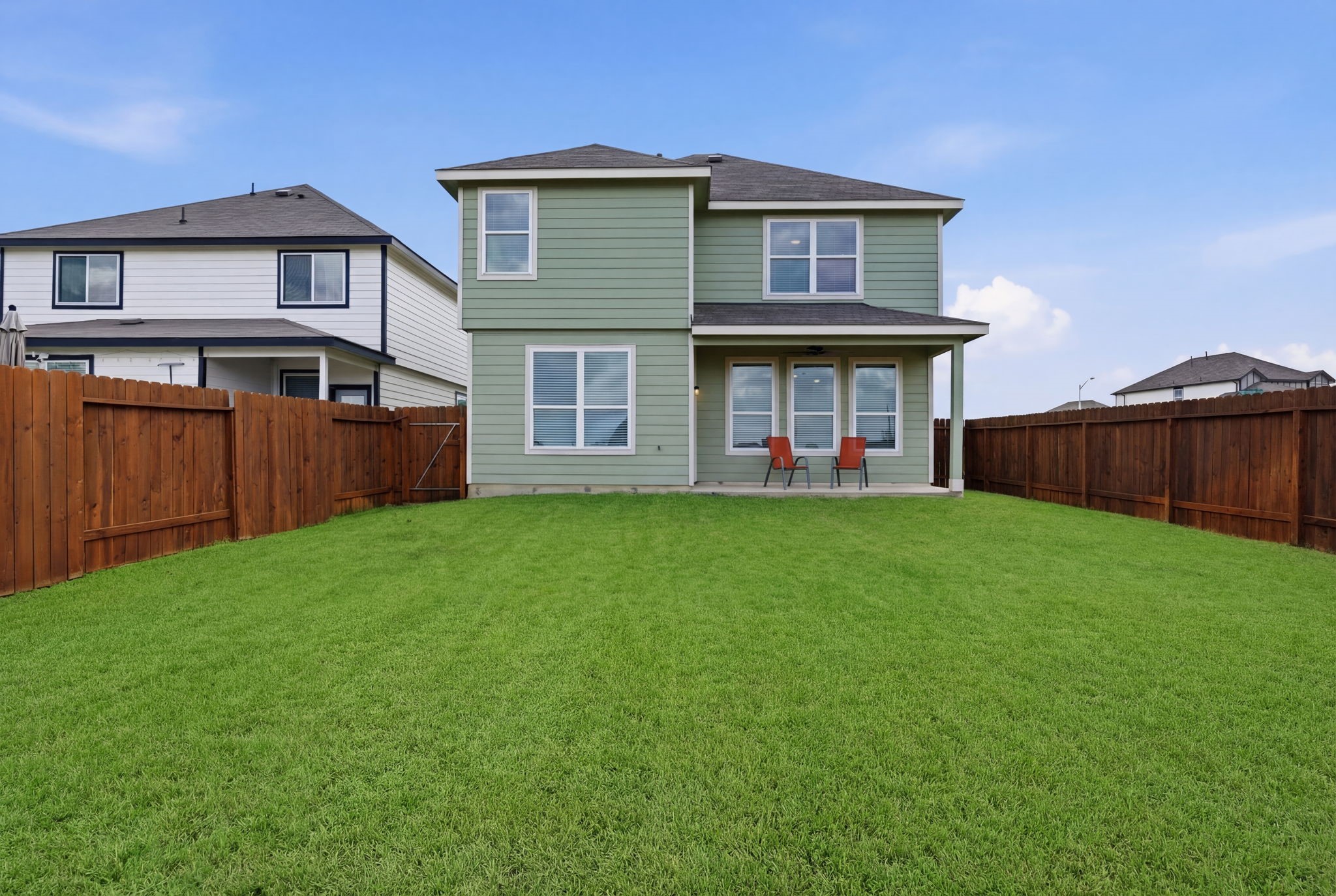 2542 Sturgeon Way Conroe, TX 77384 - Photo 31 of 40 a view of a house with a yard and wooden fence