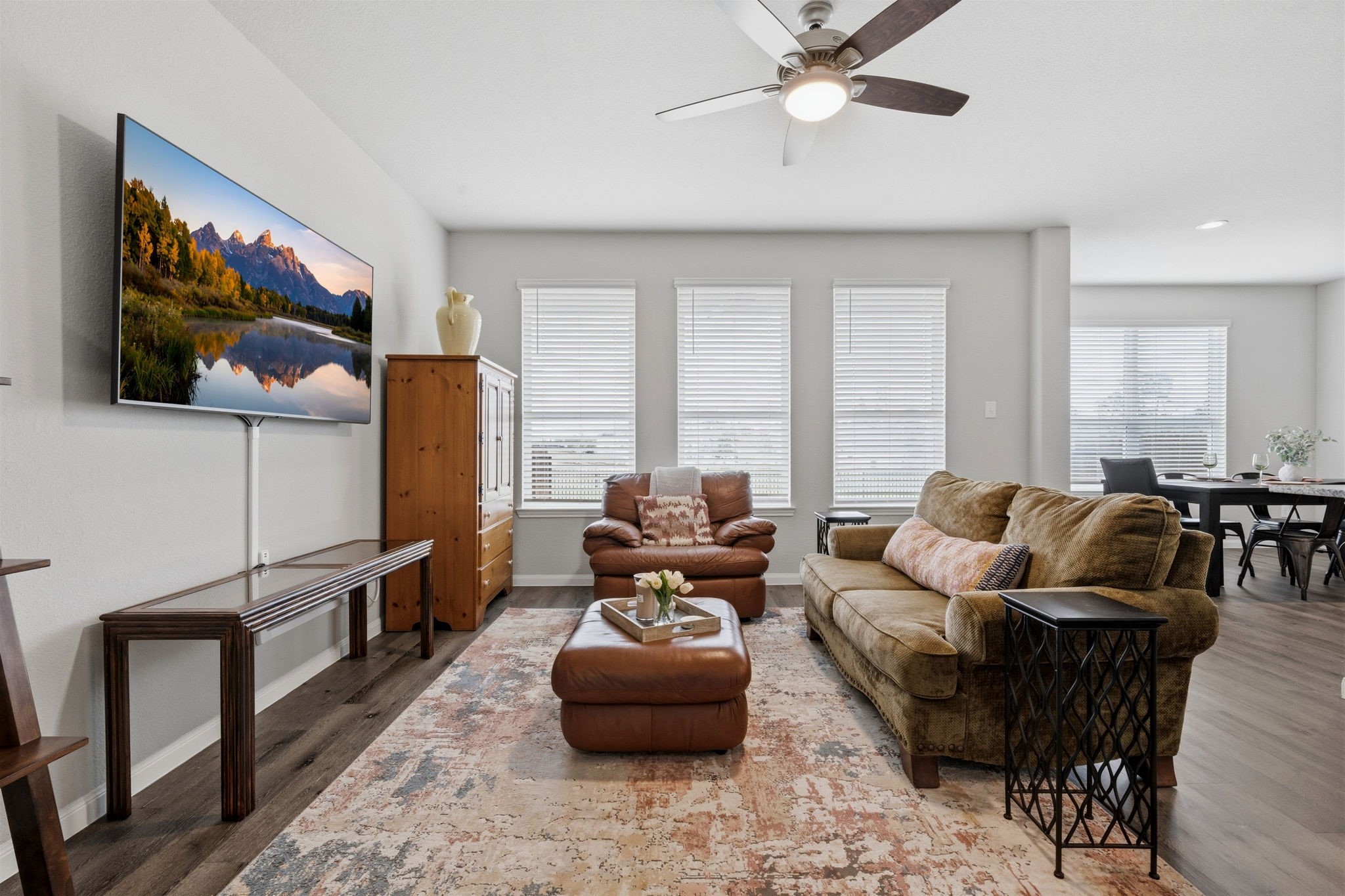 2542 Sturgeon Way Conroe, TX 77384 - Photo 9 of 40 a living room with furniture and a flat screen tv