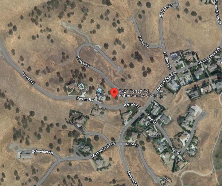 9421 Perrett Road Patterson, CA 95363 - Photo 4 of 5 a bathroom with a bathtub and shower