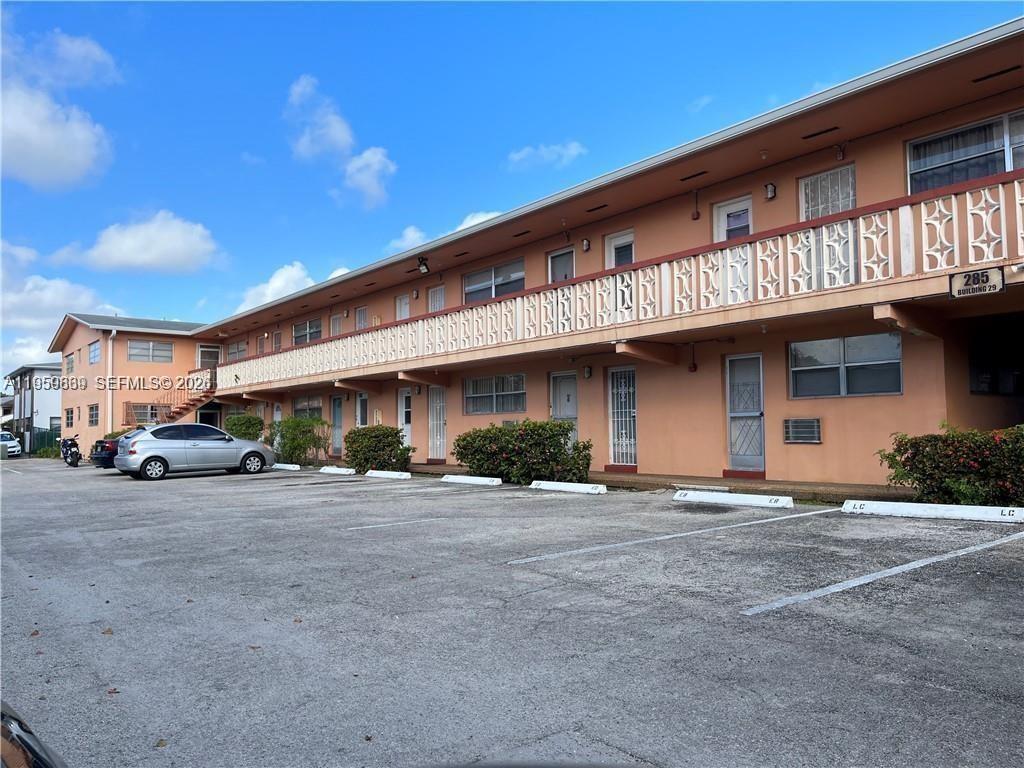 285 Northeast 191st Street, Unit 2907 Miami, FL 33179 - Photo 12 of 13 a view of a building with a street