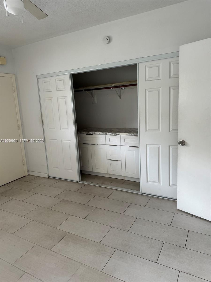 285 Northeast 191st Street, Unit 2907 Miami, FL 33179 - Photo 7 of 13 a view of a livingroom with an empty space