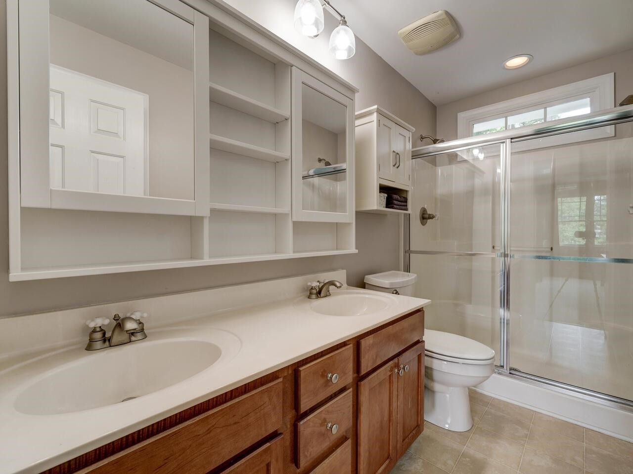 1015 Scotts Ridge Trail Apex, NC 27502 - Photo 25 of 51 Walk in shower with dual shower heads and a dual vanity. Master Bath/Spa