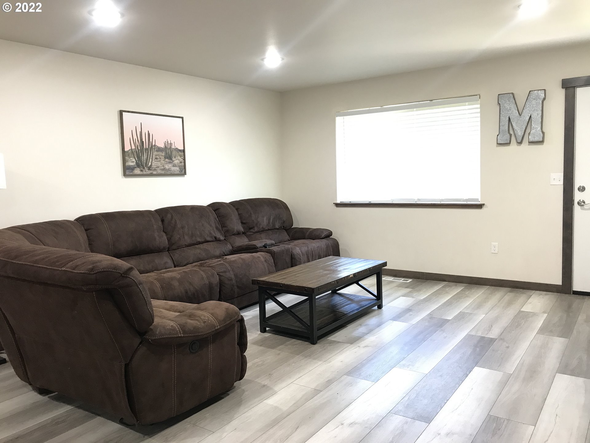 1239 Southwest 12th Street Pendleton, OR 97801 - Photo 3 of 12 a living room with furniture and a window