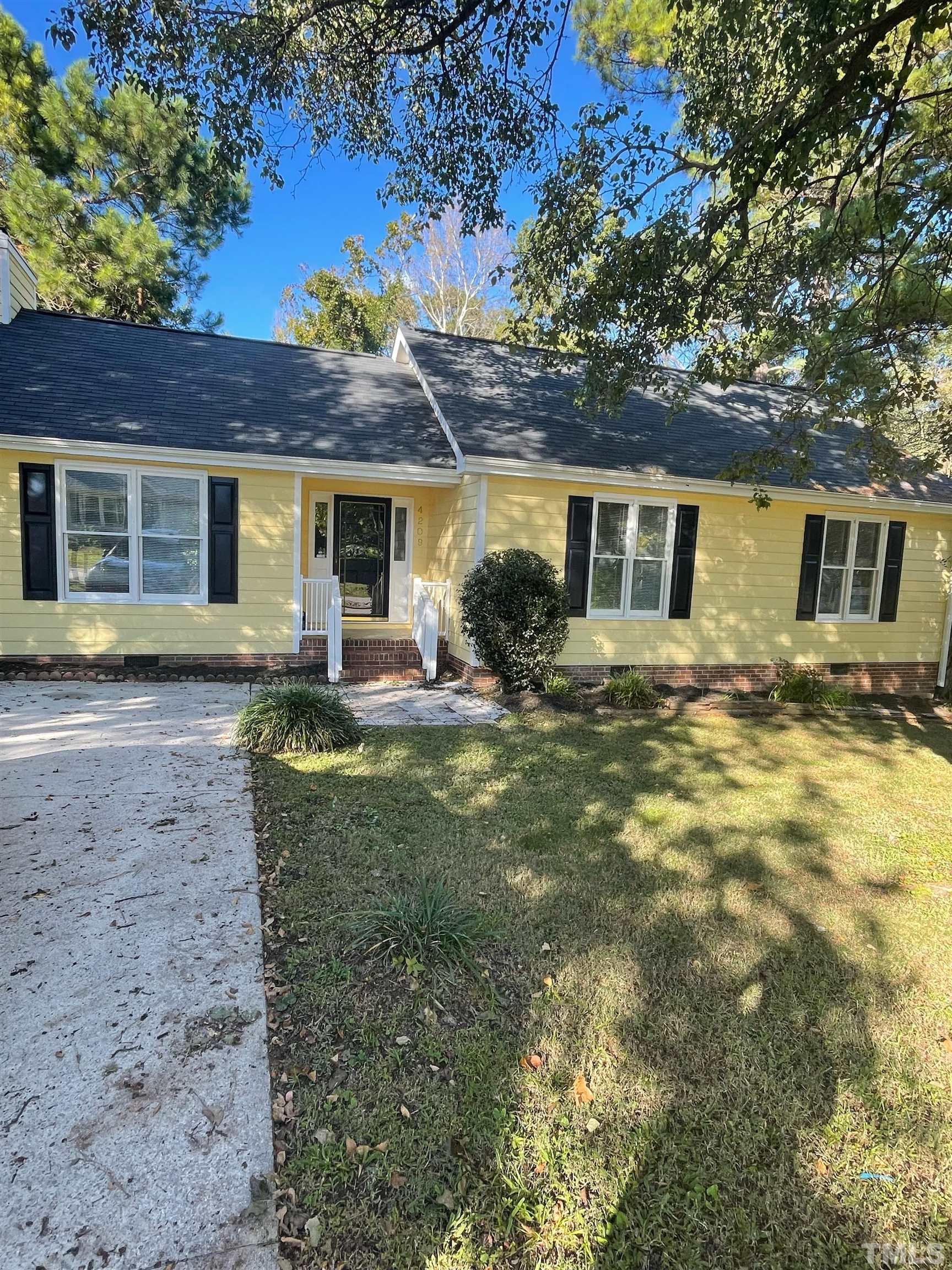 4209 Traders Dock Court Raleigh, NC 27616 - Photo 1 of 17 a view of a house with a backyard
