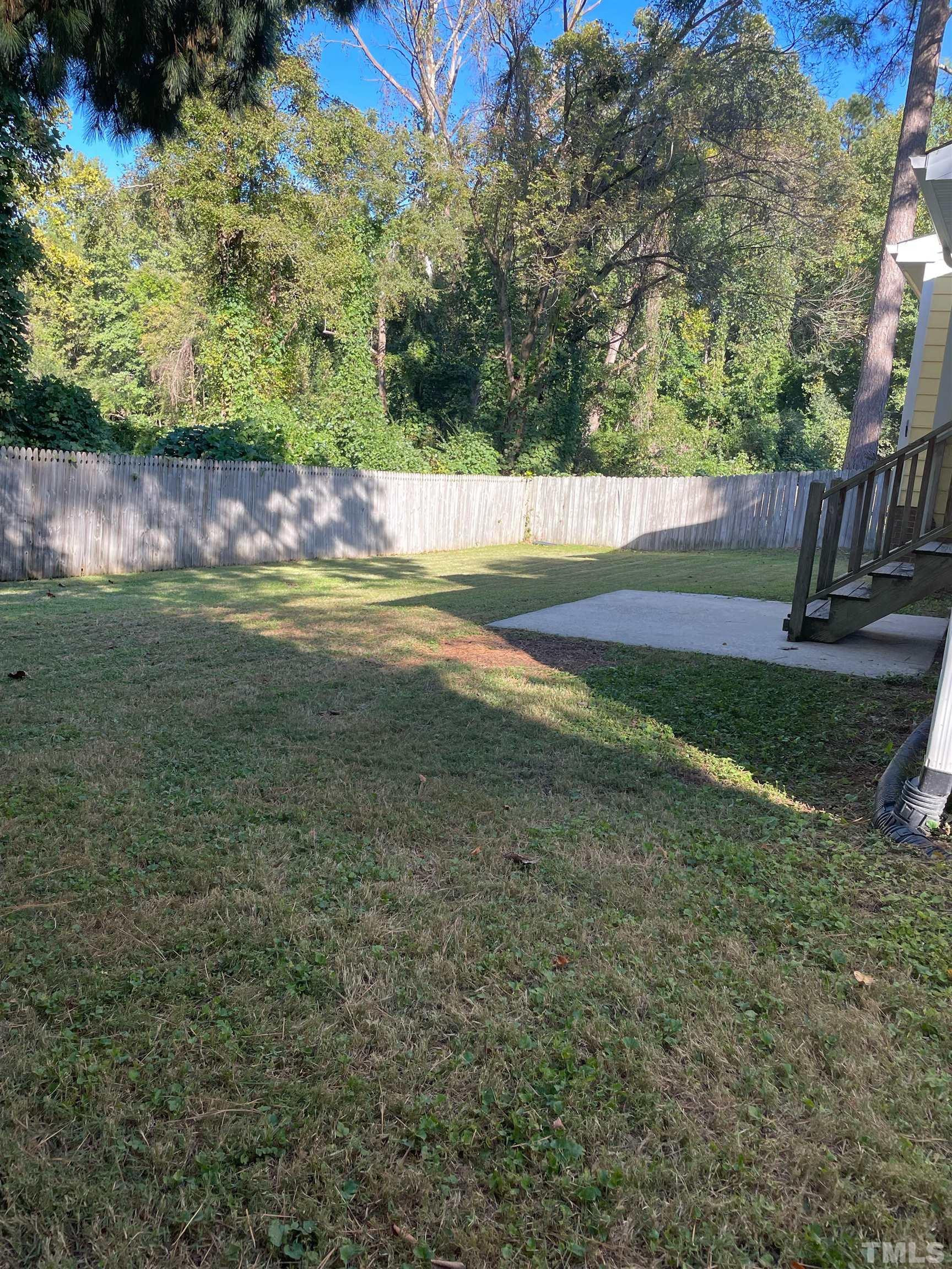 4209 Traders Dock Court Raleigh, NC 27616 - Photo 2 of 17 a view of yard with green space
